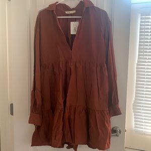 La Ven Rust color long sleeve tiered dress.
